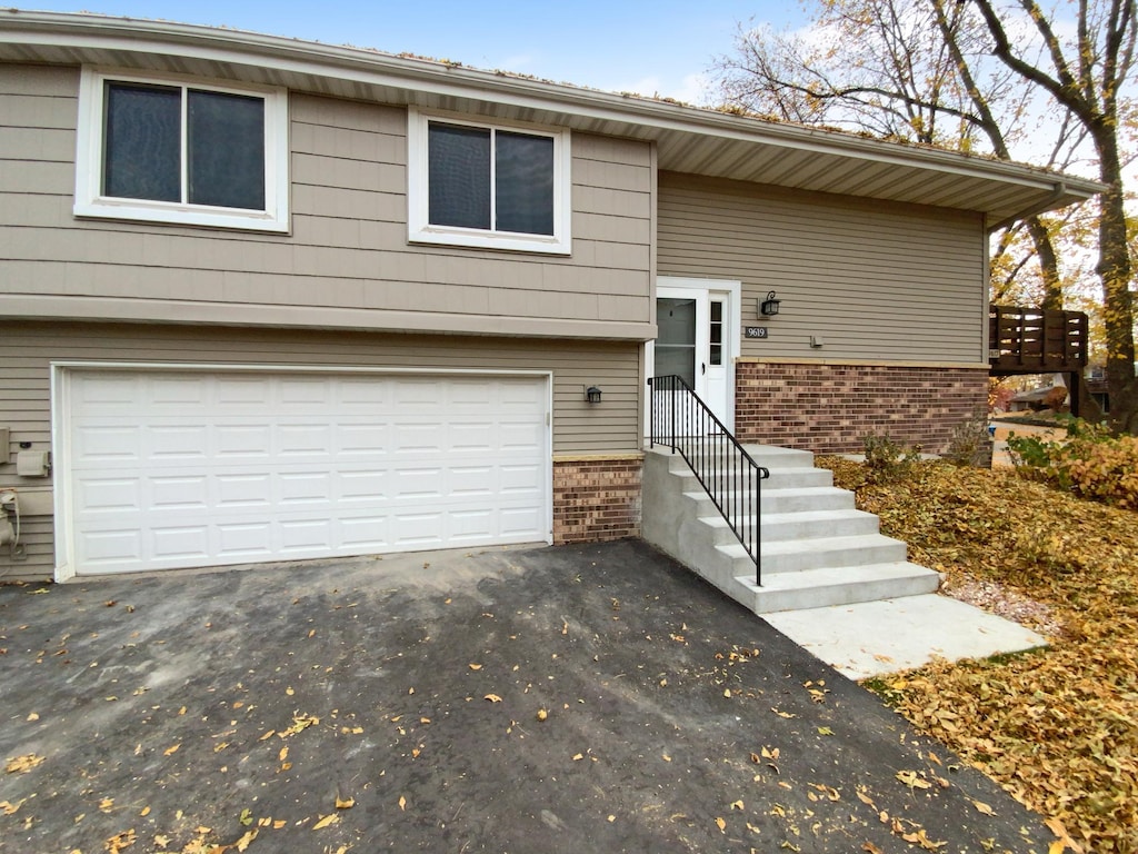 raised ranch with a garage