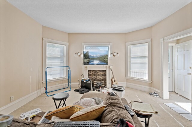 2523 Dupont Ave N, Minneapolis, MN 55411 - sitting room featuring a textured ceiling, light carpet, and baseboards