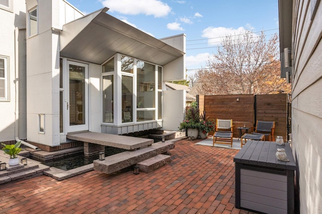 view of patio with fence