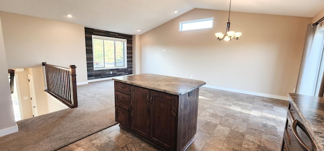 kitchen with light carpet, an inviting chandelier, vaulted ceiling, decorative light fixtures, and a center island