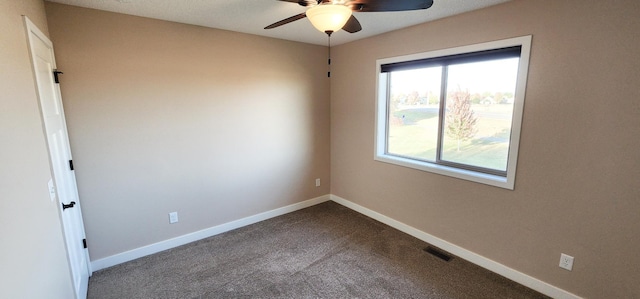 unfurnished room featuring carpet floors and ceiling fan