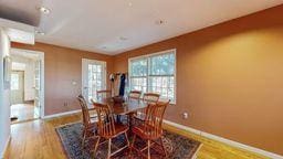 dining room featuring wood-type flooring