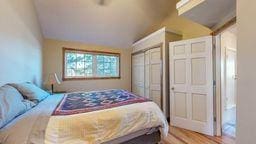 bedroom featuring vaulted ceiling