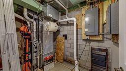 utility room with electric panel