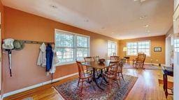 22735 Hickory Rd, Lanesboro, MN 55949 - dining area featuring baseboards and wood finished floors