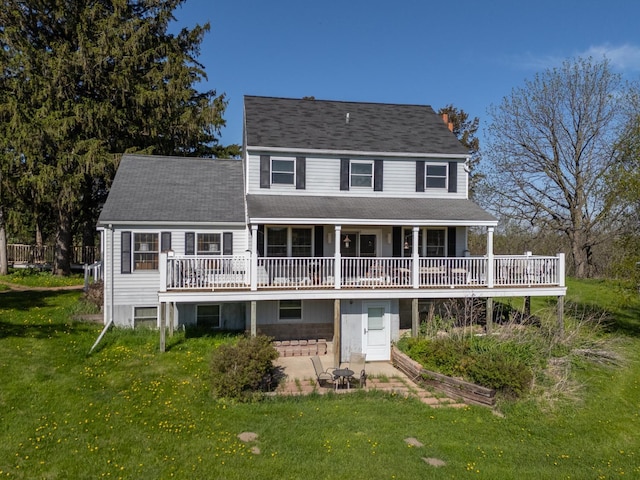 22735 Hickory Rd, Lanesboro, MN 55949 - back of house with a yard, a patio area, a wooden deck, and a shingled roof