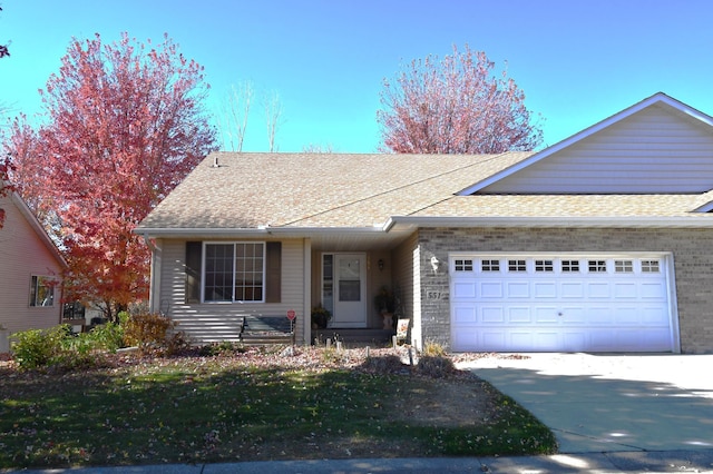 ranch-style home featuring a garage