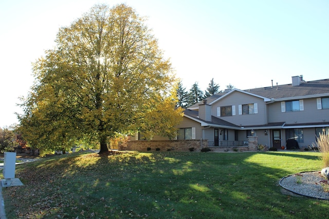 exterior space featuring a front lawn