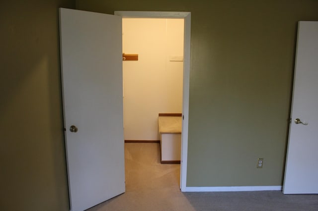 unfurnished bedroom with carpet floors