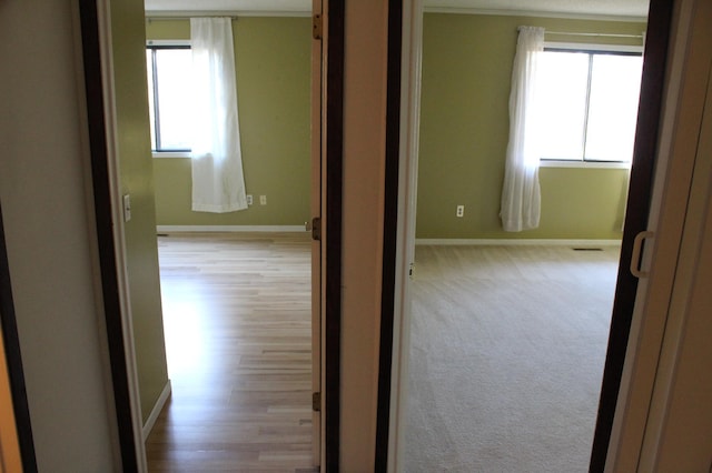 hallway featuring light hardwood / wood-style floors