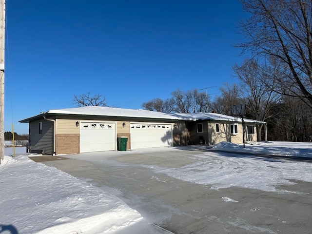 view of front of home with a garage