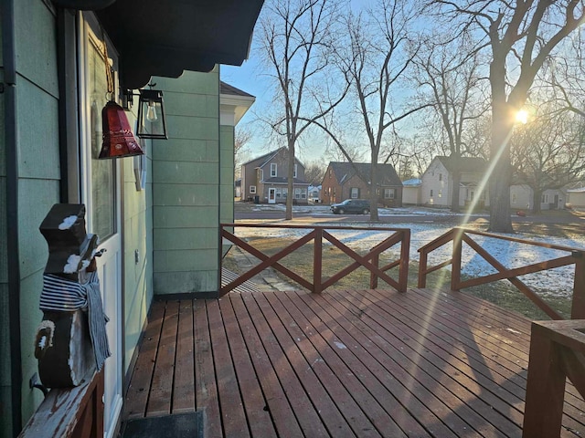 wooden terrace with a residential view