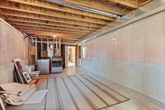 214 15th Ave SE, Lonsdale, MN 55046 - unfinished basement with refrigerator and separate washer and dryer