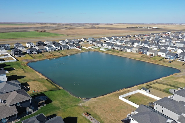 bird's eye view featuring a water view and a rural view