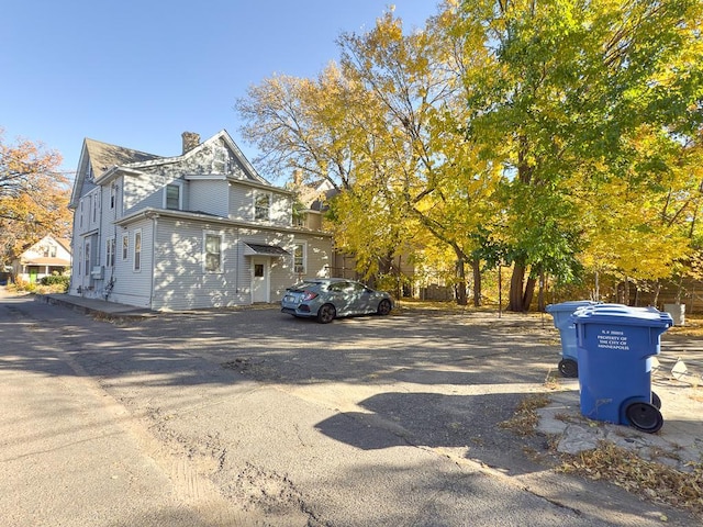 view of front of home with a chimney