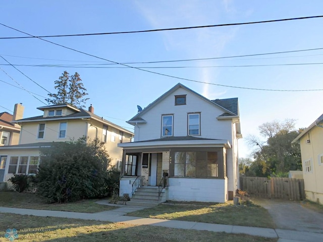 view of front of property featuring covered porch