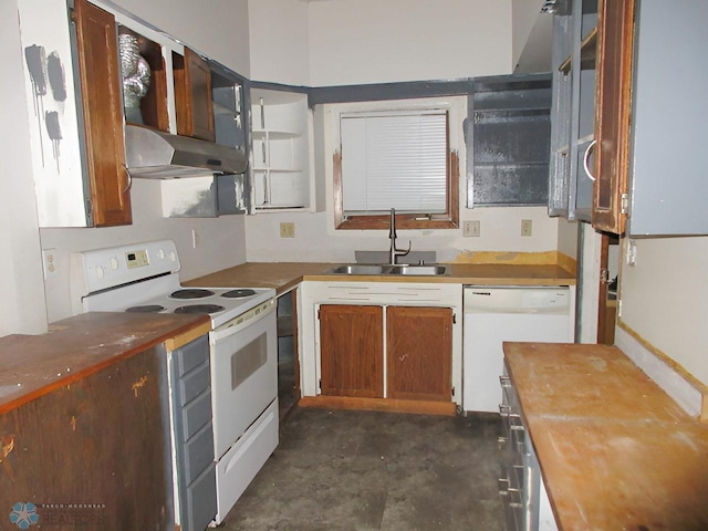 kitchen featuring white appliances and sink