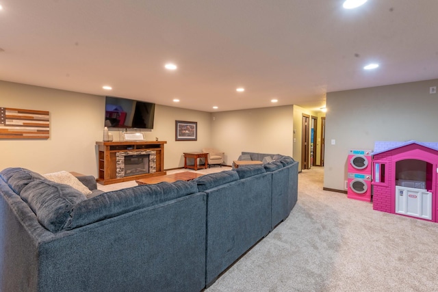 carpeted living room with a fireplace