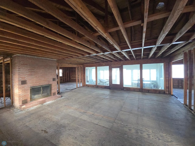 misc room featuring a brick fireplace