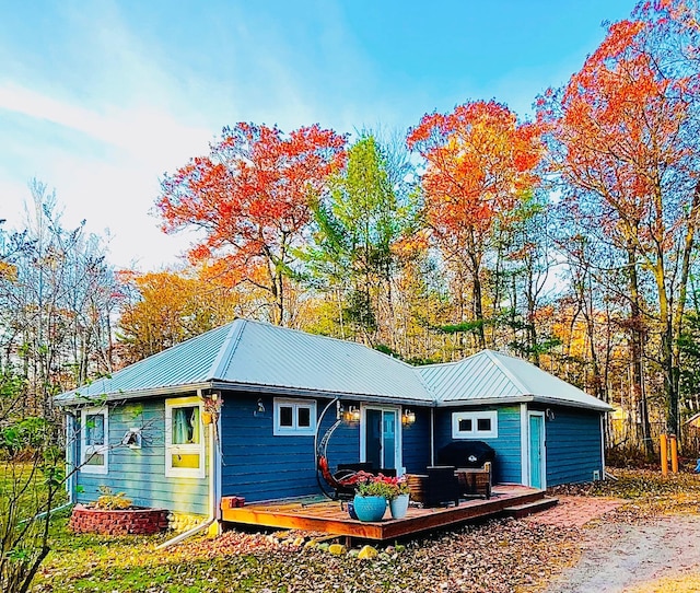 exterior space featuring a wooden deck