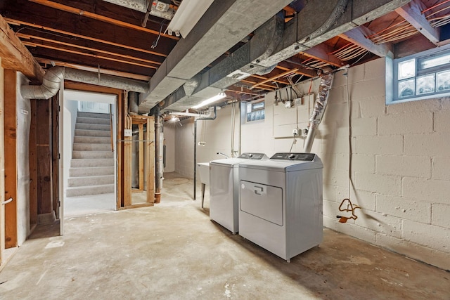 basement with separate washer and dryer