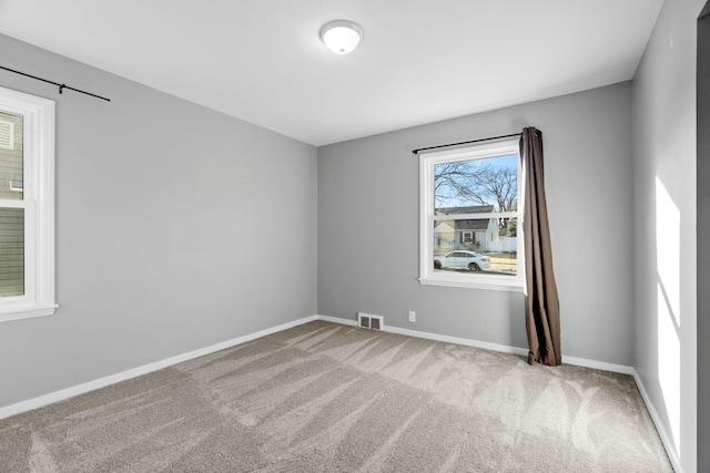 view of carpeted spare room