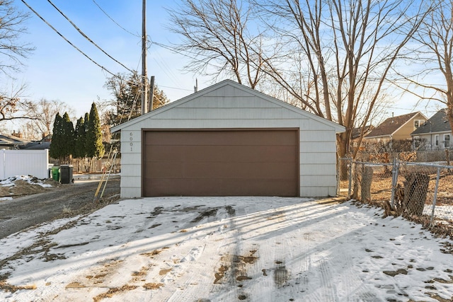 view of snow covered garage