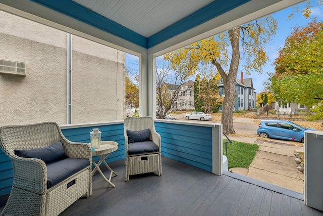 2742 Dupont Ave S, Minneapolis, MN 55408 - sunroom with plenty of natural light and a residential view