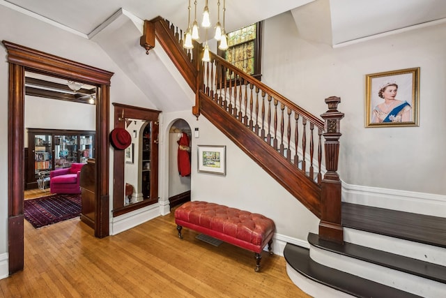 2742 Dupont Ave S, Minneapolis, MN 55408 - stairs featuring wood finished floors and baseboards