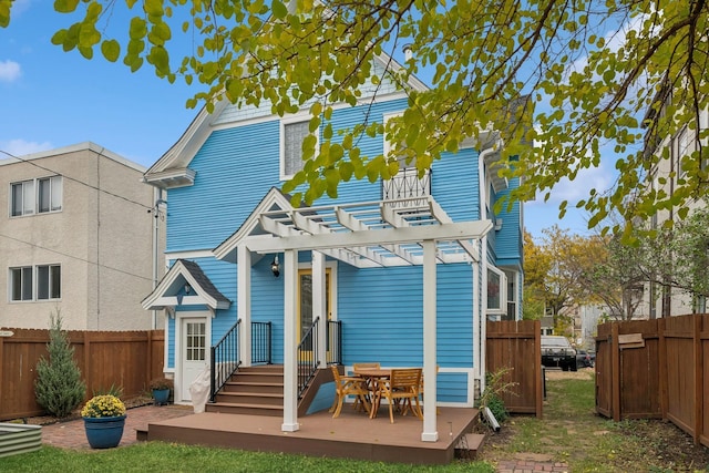 2742 Dupont Ave S, Minneapolis, MN 55408 - rear view of house featuring a pergola and a wooden deck