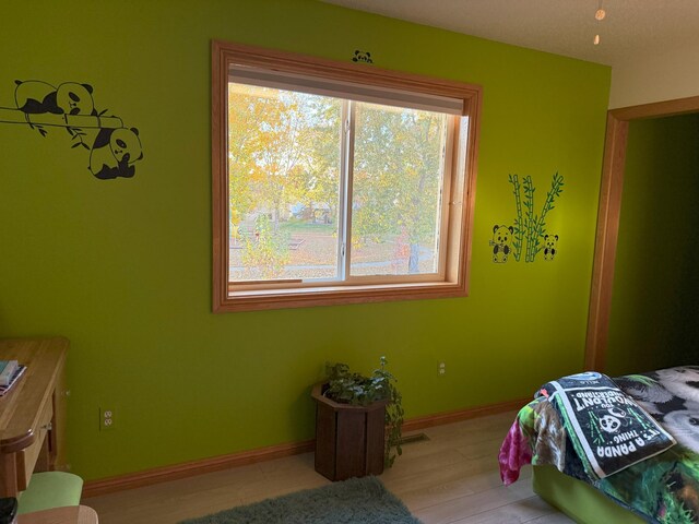 bedroom featuring light wood-type flooring