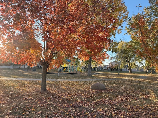 view of home's community featuring a playground