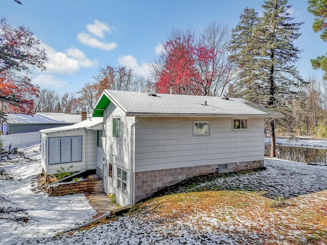 view of snow covered property