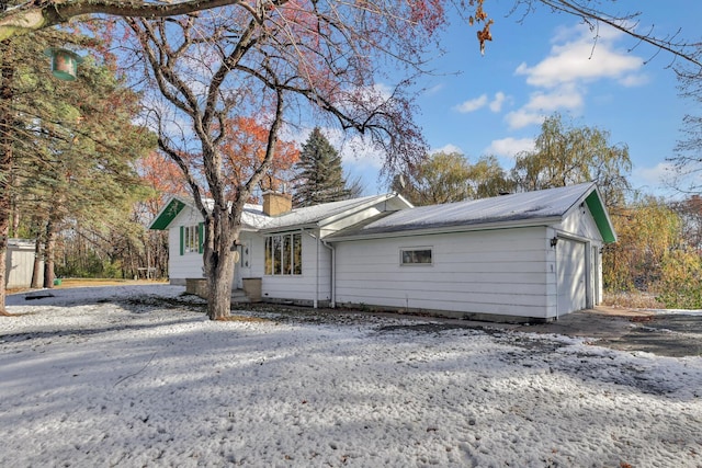 exterior space with a garage