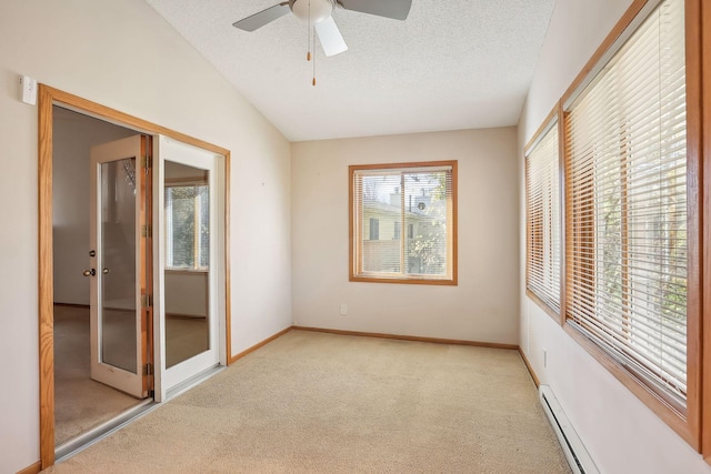 unfurnished bedroom with ceiling fan, a textured ceiling, vaulted ceiling, and baseboard heating