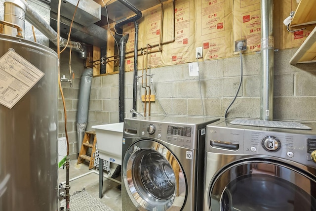 laundry area featuring washer and dryer and gas water heater