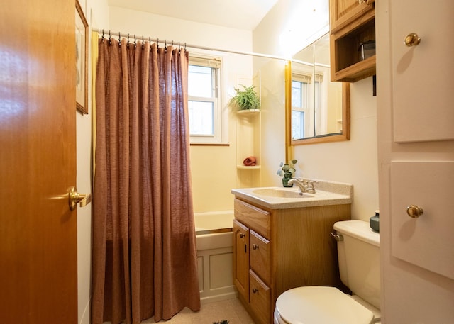 full bathroom with tile patterned flooring, shower / bath combination with curtain, vanity, and toilet