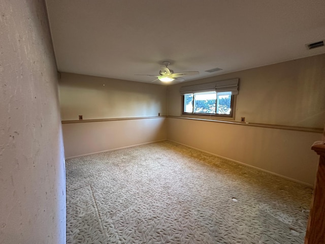 unfurnished room featuring ceiling fan