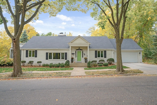 single story home with a garage