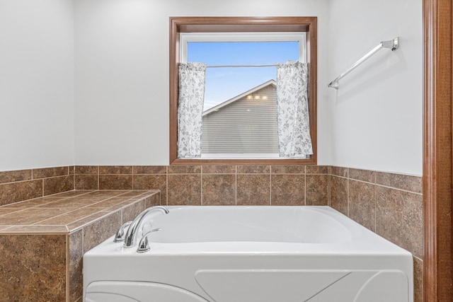 bathroom with a tub