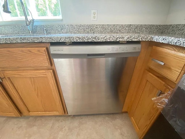 room details featuring stainless steel dishwasher