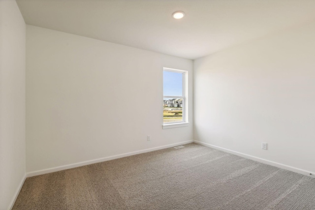 view of carpeted spare room