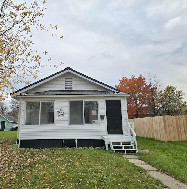 exterior space with a lawn