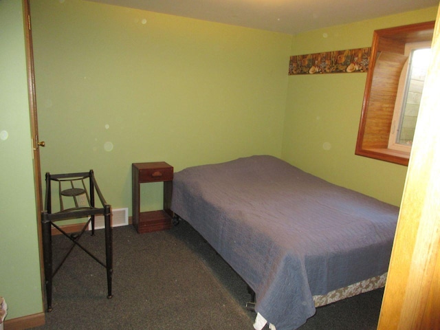 bedroom featuring carpet