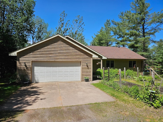 single story home with a garage
