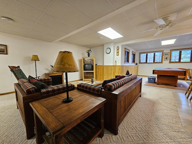 N13475 Narrows Trl, Minong, WI 54859 - carpeted living area featuring a paneled ceiling, wooden walls, a ceiling fan, wainscoting, and billiards table
