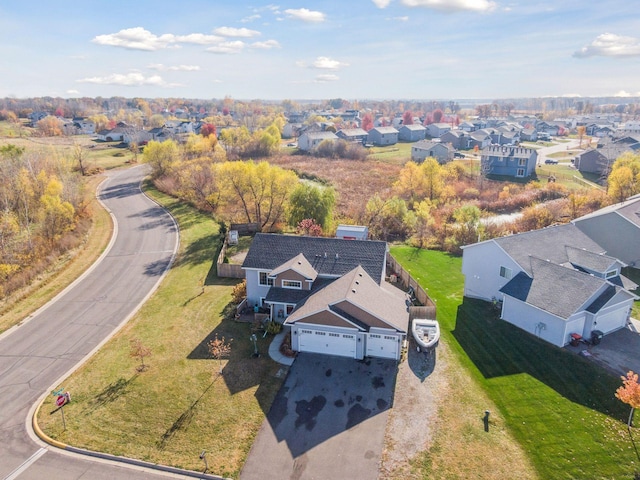 birds eye view of property with a residential view