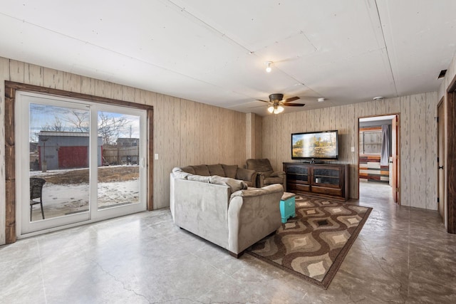 living area featuring wooden walls