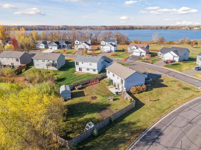 bird's eye view with a water view and a residential view