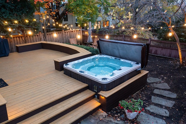 view of swimming pool featuring a wooden deck